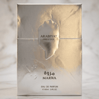 Caixa do perfume Marwa da Arabiyat Prestige em dourado texturizado, sobre fundo de mármore.