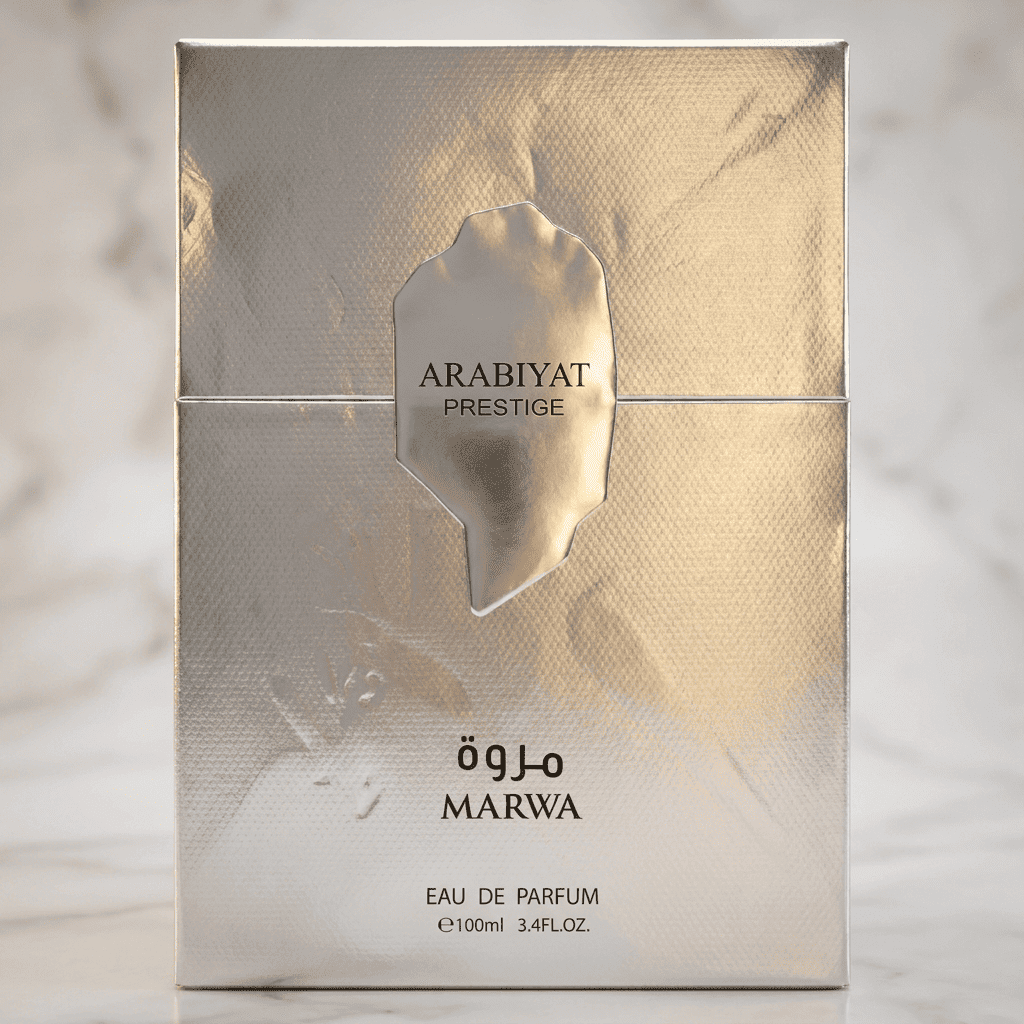 Caixa do perfume Marwa da Arabiyat Prestige em dourado texturizado, sobre fundo de mármore.
