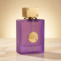 Perfume Club de Nuit Maleka da Armaf em frasco roxo com tampa dourada, vista frontal sobre mármore.
