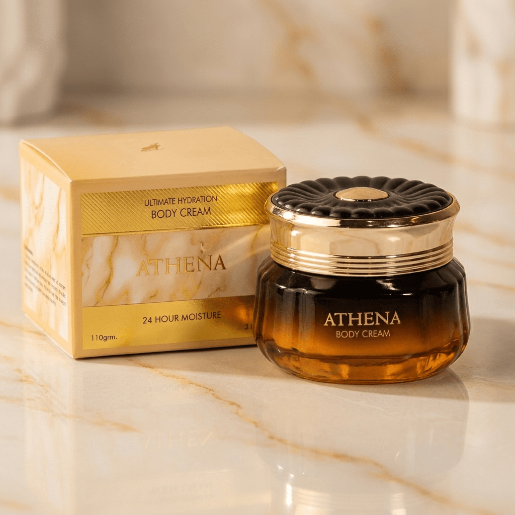Creme corporal Athena Ultimate Hydration, pote dourado com tampa preta canelada ao lado da caixa, 110g.