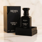 Perfume Vanilla P*rn da Bidaya Parfums em frasco preto fosco, ao lado da caixa preta original aberta, sobre mármore