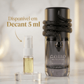 Decant de 5 ml do perfume Musamam Black Intense da Lattafa ao lado do frasco original com escultura de serpente.