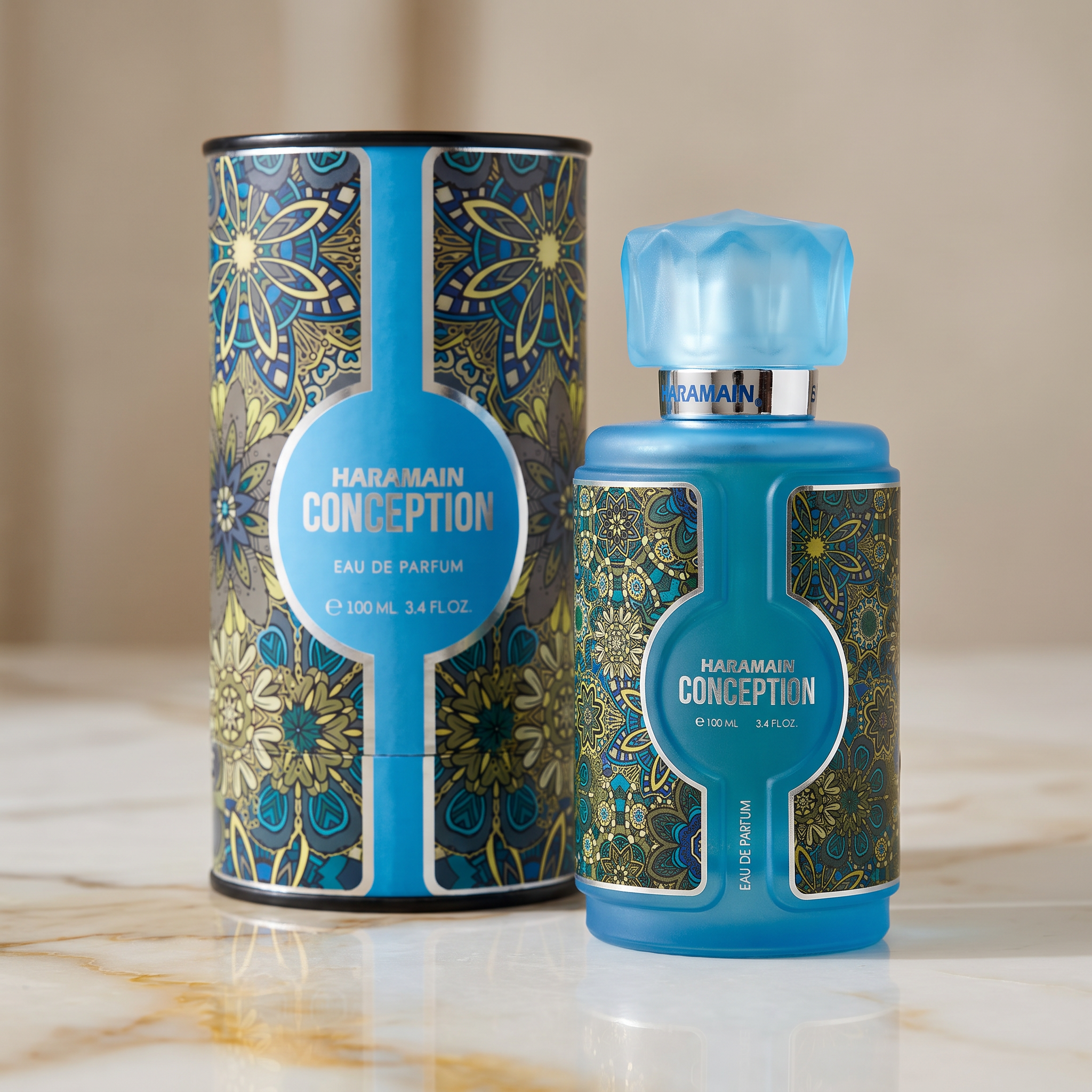 Frasco azul do perfume Al Haramain Conception Eau de Parfum 100 ml com estampa floral dourada, ao lado da caixa cilíndrica.