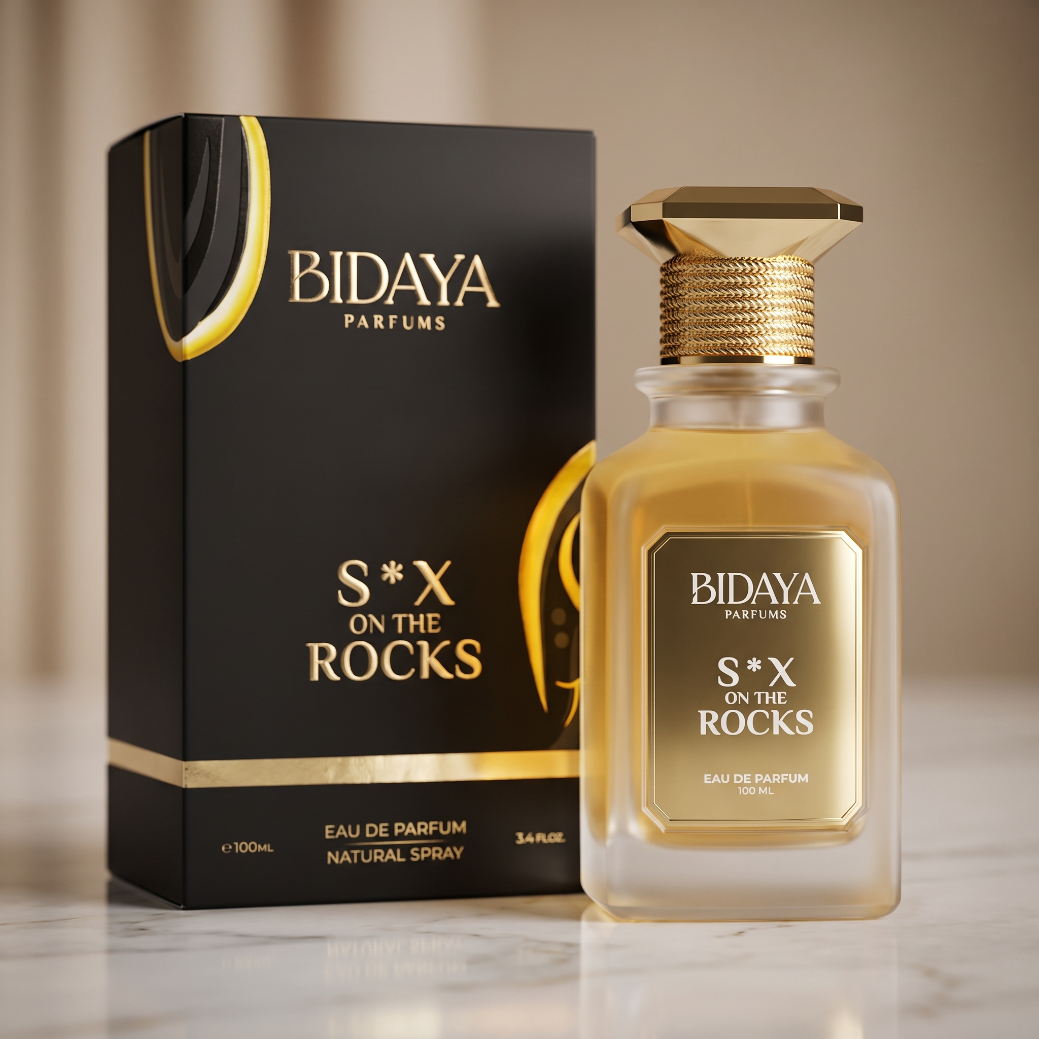 Perfume Bidaya Parfums S*X on the Rocks eau de parfum 100ml, frasco dourado facetado ao lado da caixa preta