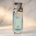 Perfume Nexa Immortal Masculino da Rue Broca, frasco de vidro iridescente com tampa metálica angular.